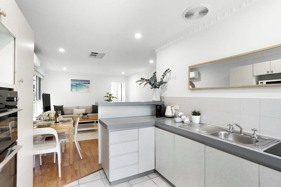 Modern kitchen and cozy living space.