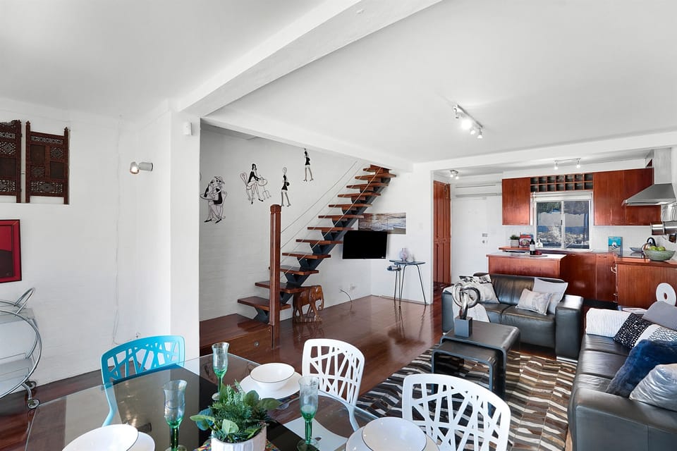 Staircase to 2nd floor and bedrooms upstairs