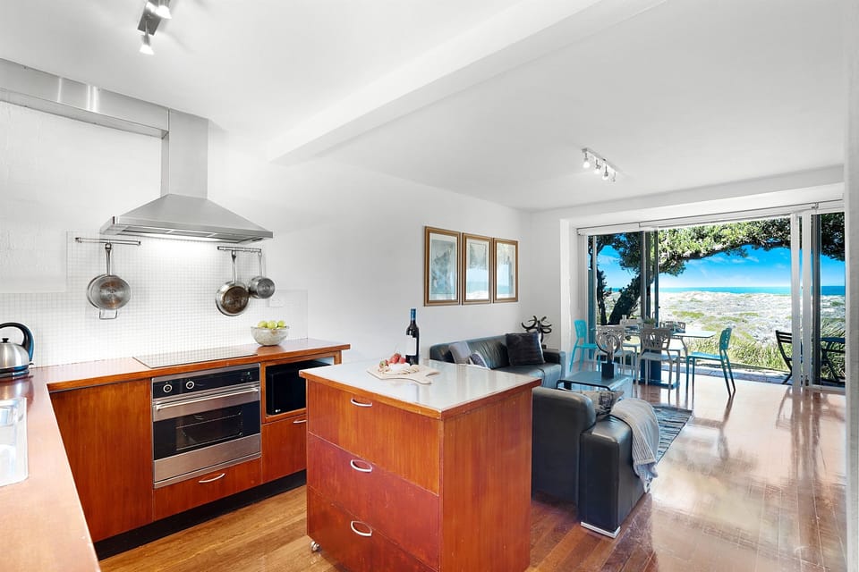 Kitchen with island for communal meal prepping