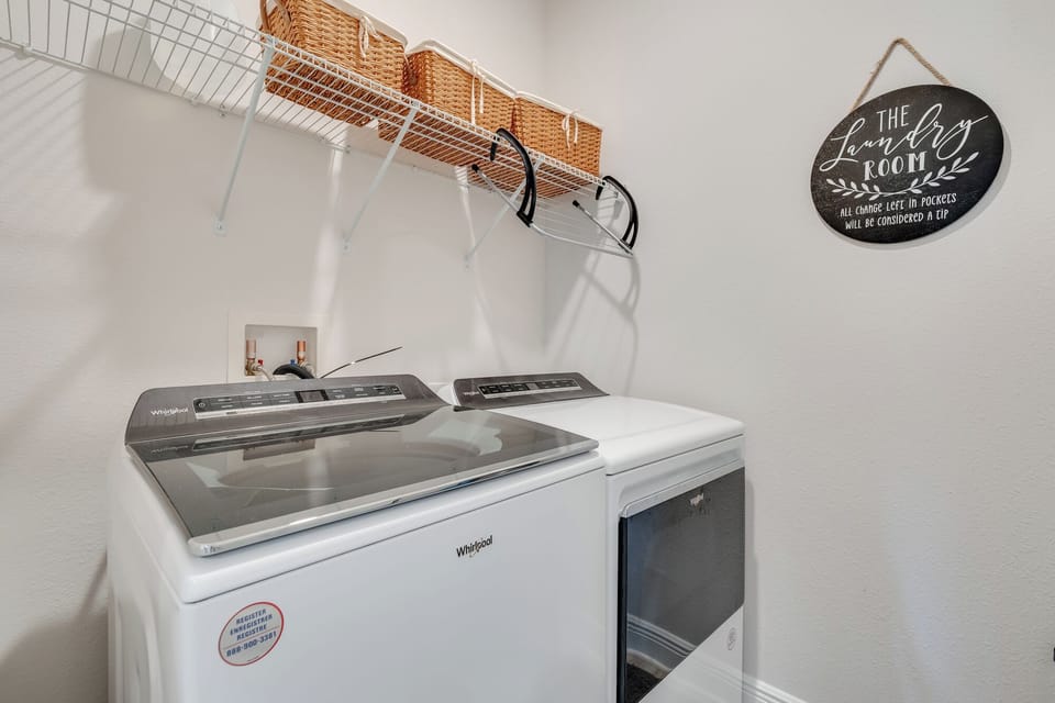 Your dedicated laundry space keeps your vacation wardrobe fresh with full-size washer and dryer, plus organized storage for linens.