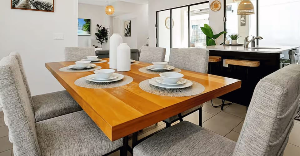 The dining room offers an elegant space for family meals and special gatherings, with a warm, inviting atmosphere.