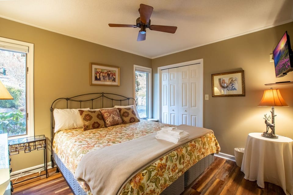 Main Level King Bedroom with TV and Private Bathroom