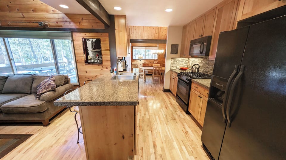 Galley Kitchen with gas range and oven