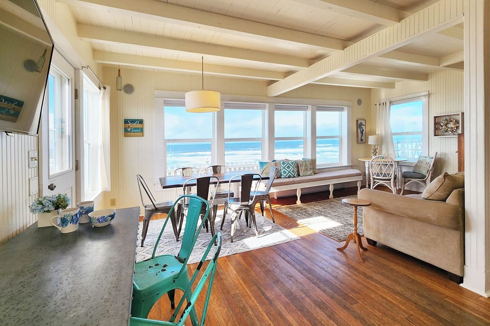 Open concept living and dining room with views