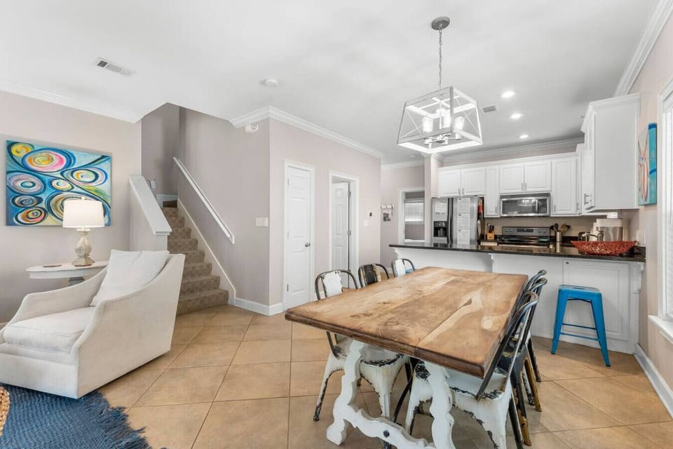 Open Kitchen Concept with tasteful appliances and dining area