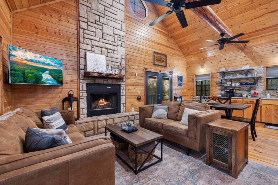 "Where the fire crackles, and the heart of the cabin warms."