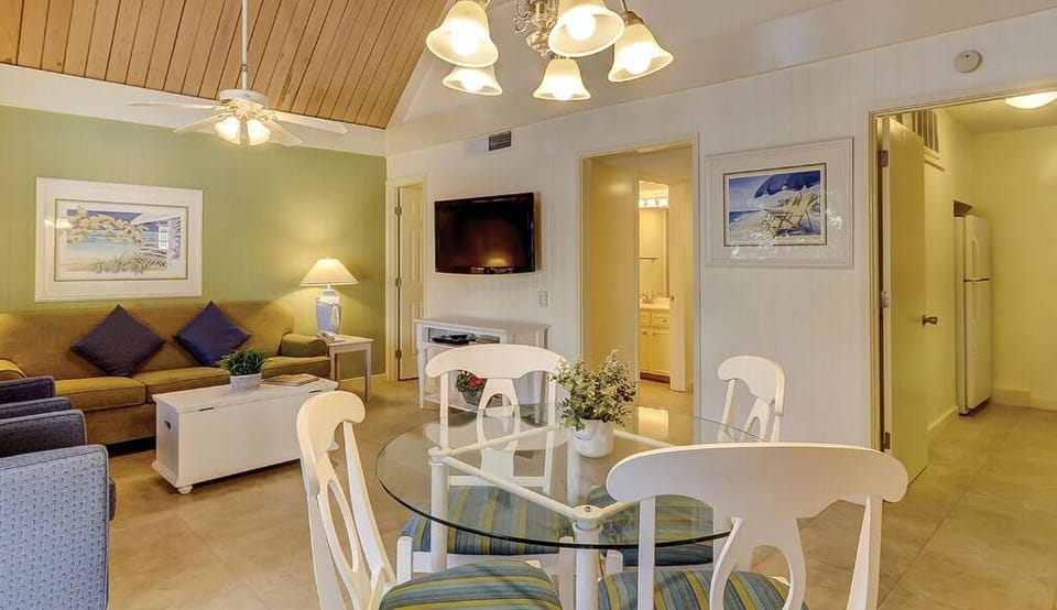 Gather for easy meals under warm lights and airy ceilings.