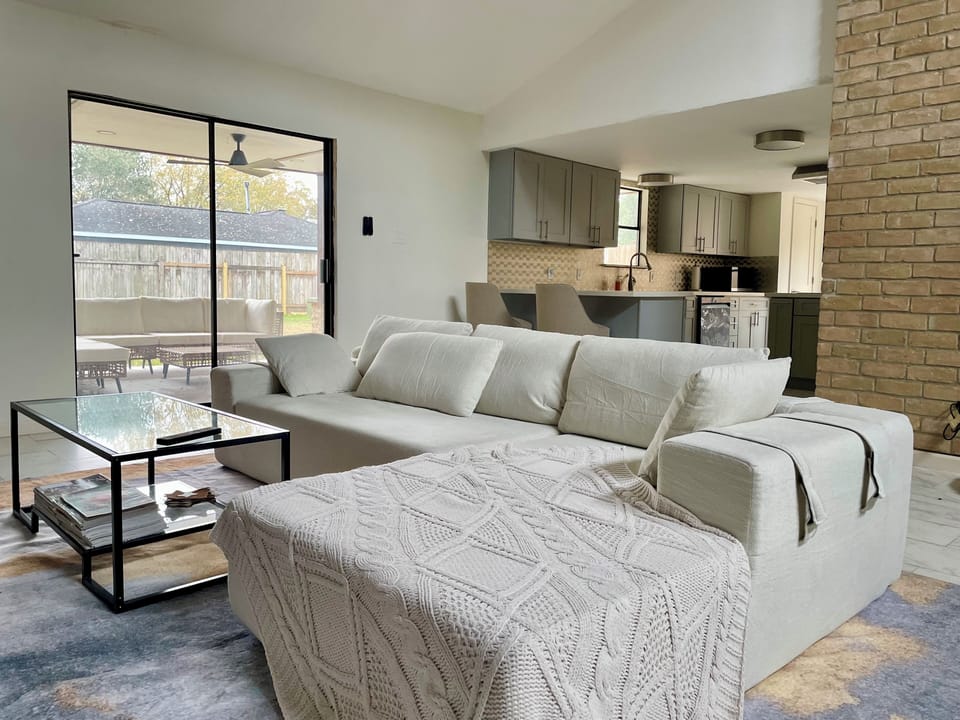 Living room sectional sofa with open kitchen