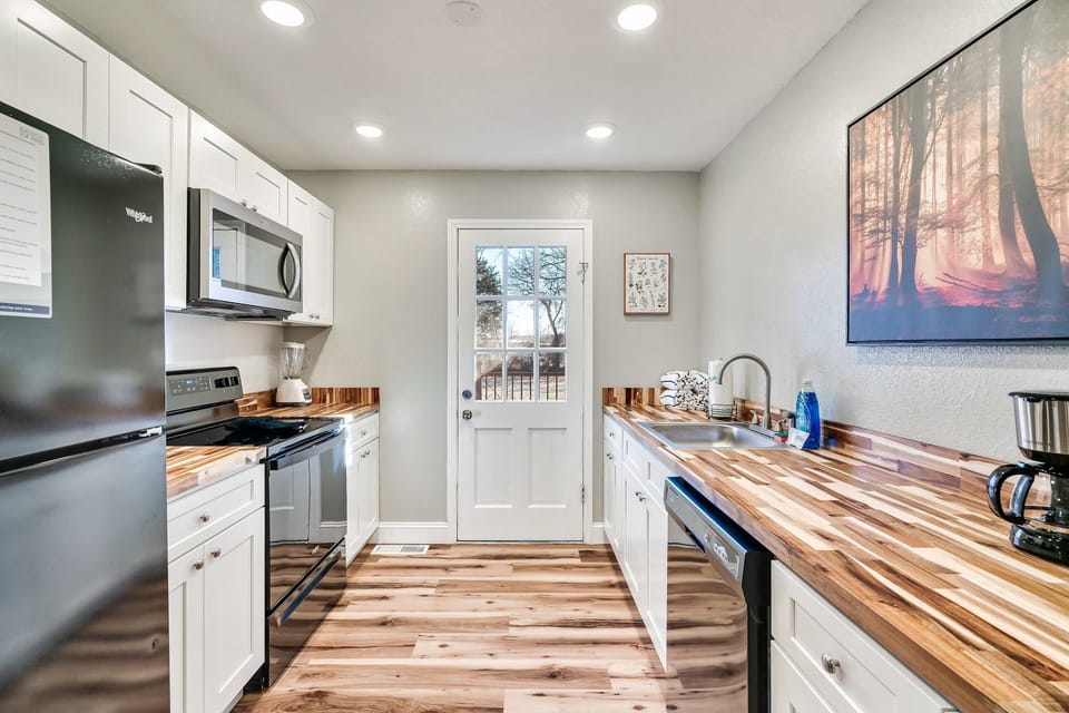 Bright and inviting space with modern appliances and scenic outdoor views!