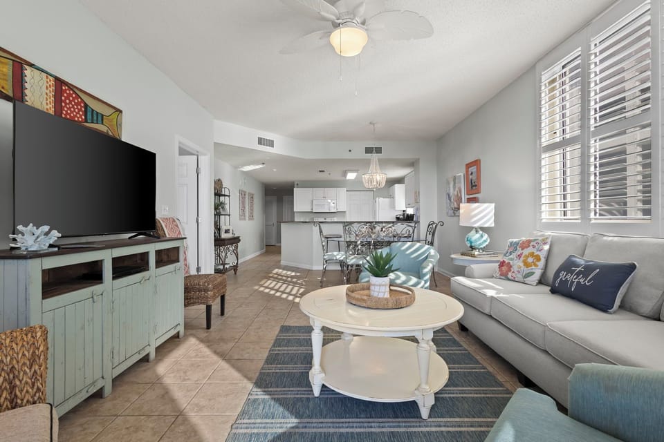 Living Area - The open living area features plenty of comfortable seating and a large television for enjoying in your down time.