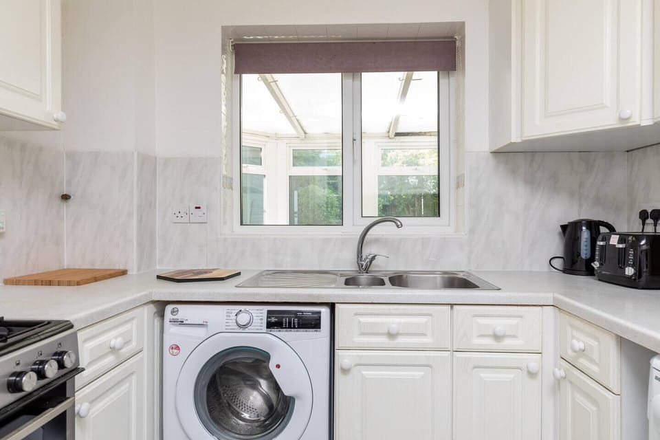 Full equipped, sleek kitchen