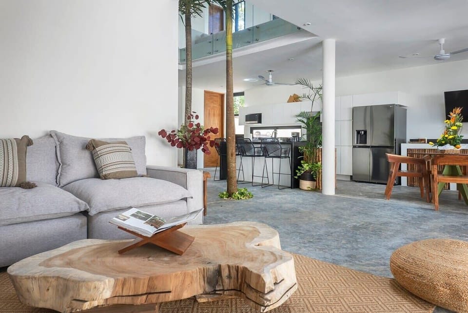 Elegant living room located on the ground floor. It shares space with the dining area and kitchen.
