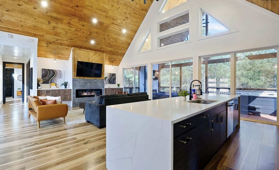 The sophisticated kitchen offers ample space & every home comfort
