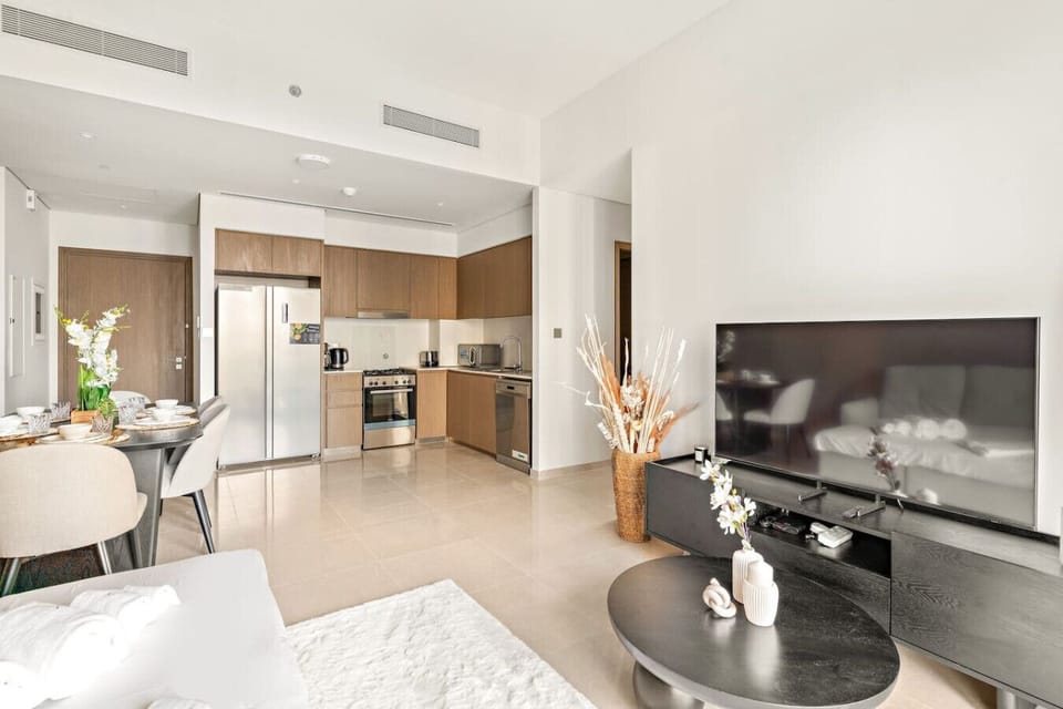 Living Room: Stylish space with modern decor, perfect for lounging after a day of adventure!