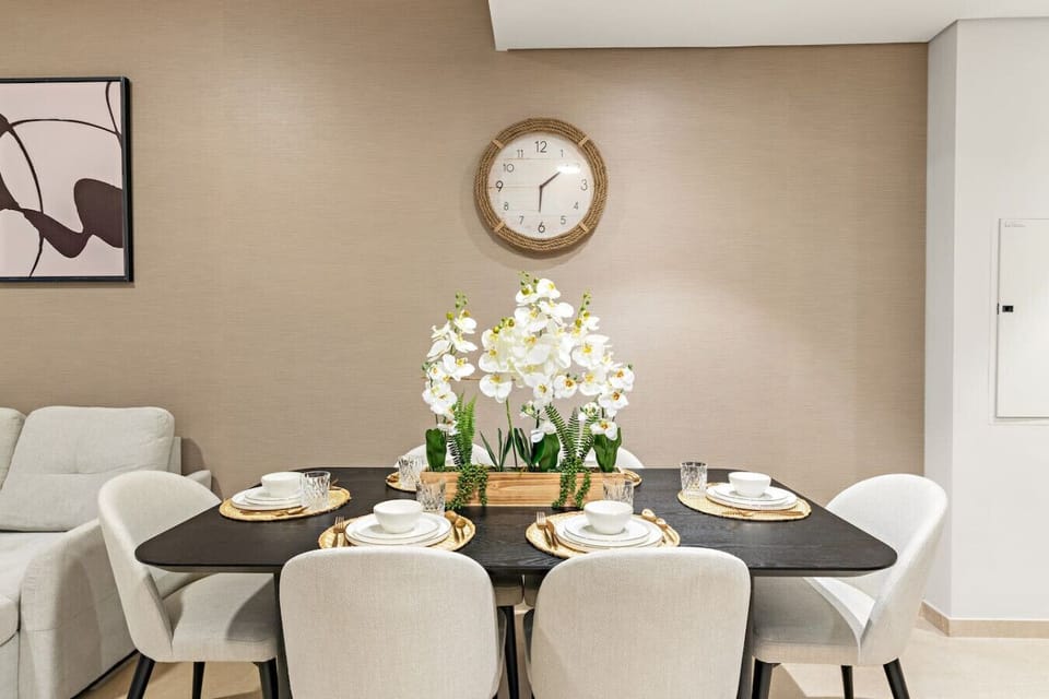 Dining Area: Delight in elegant meals surrounded by chic decor and vibrant floral accents!