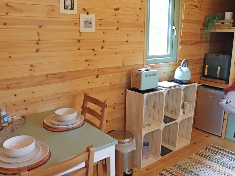 Dining Area | Shepherds Hut One - Island Hut Retreats, Rhosmeirch, near Benllech