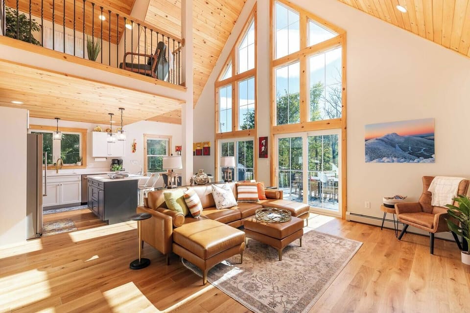 Main living area with cathedral natural pine ceilings