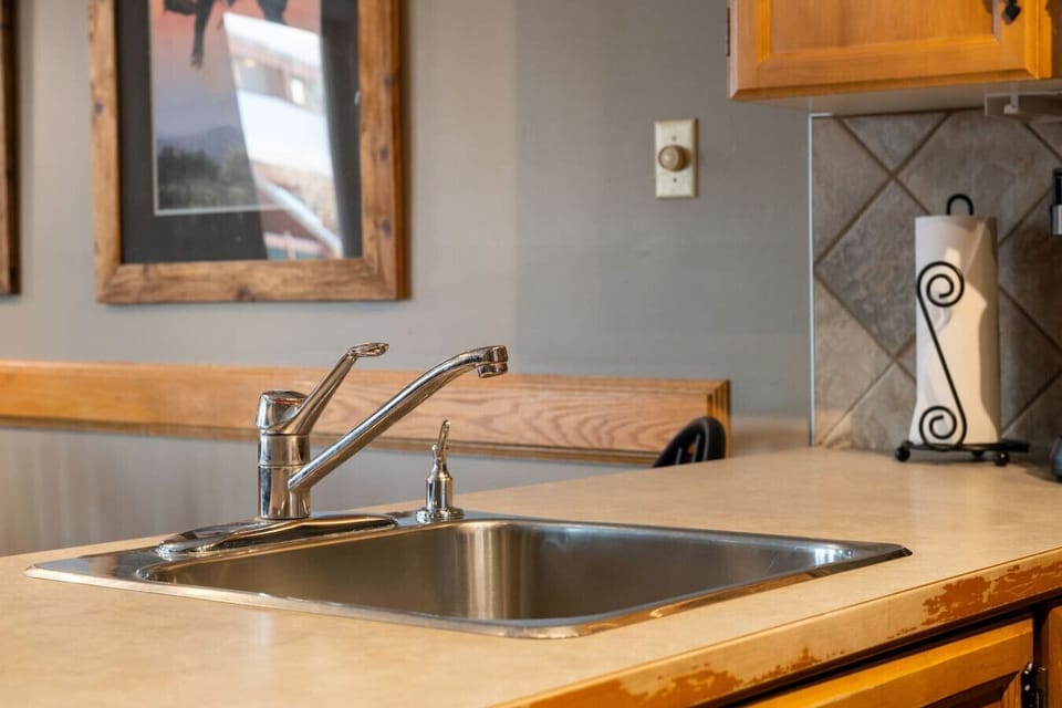 Full kitchen with a blender, crockpot/slow cooker & a drip coffee maker.