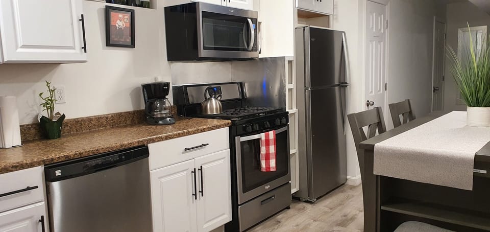 Our beautiful eat in kitchen will seat up to four (4)