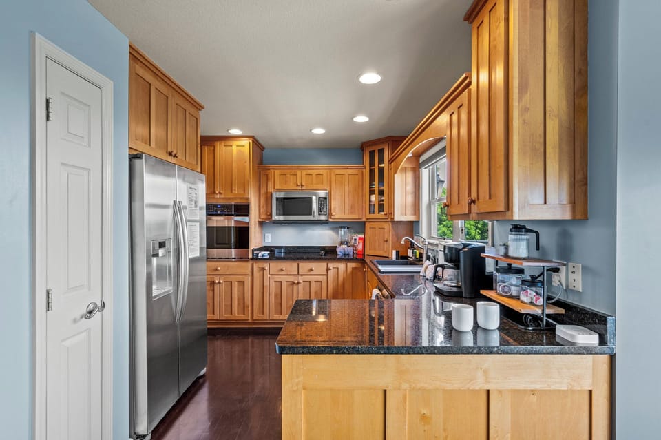 Stainless fridge, deep pantry, counter space for three cooks