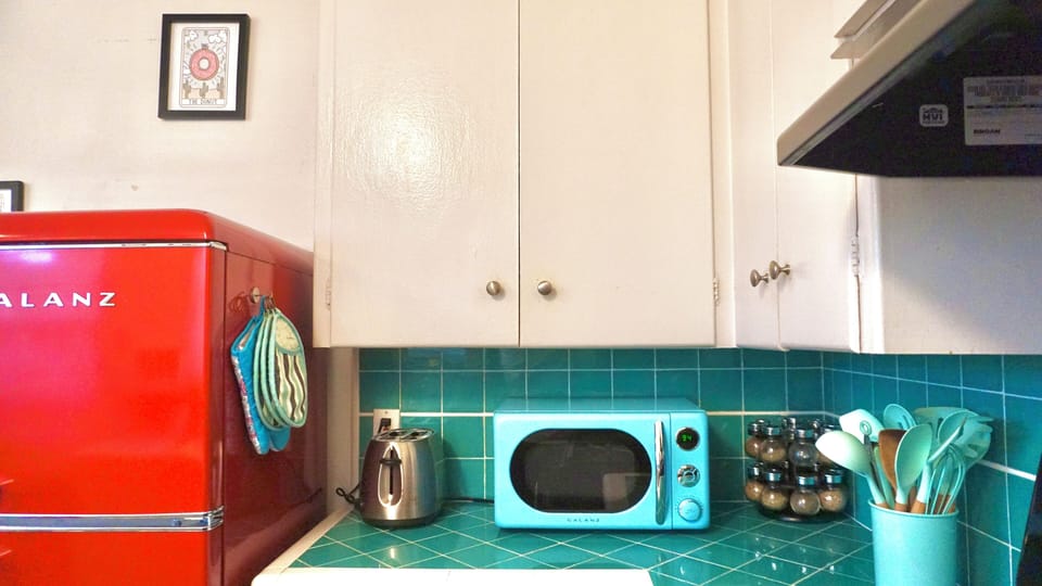 Put on an apron, slick back your hair, and jam out while you cook up a storm