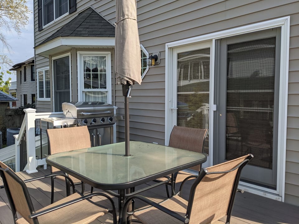 patio at rear of house with grill