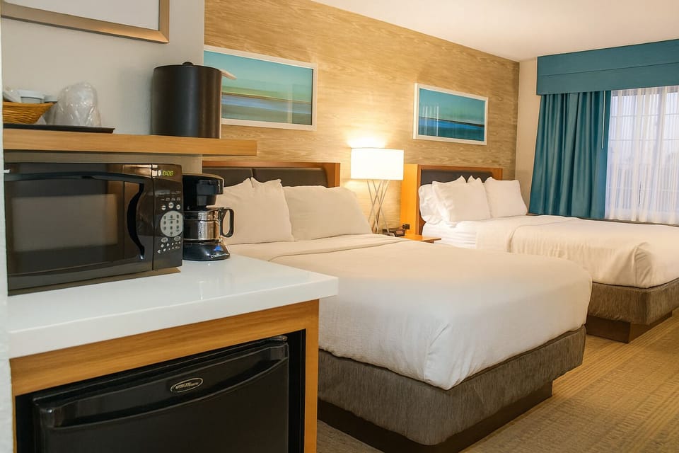 Unit with 2 Double beds. Exact unit will be assigned upon arrival. Views, colors, and decor may vary.