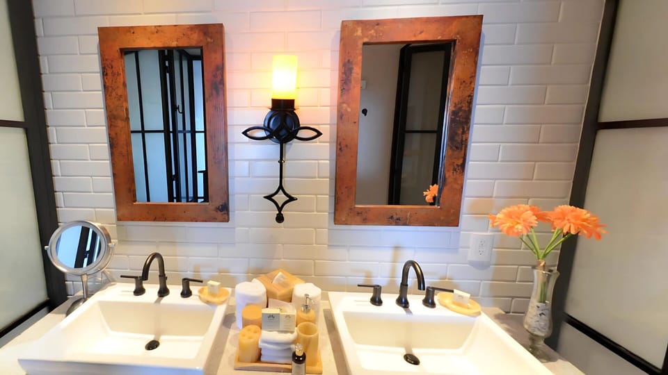 Stylish dual-sink vanity at Vista Encantada with luxury amenities.