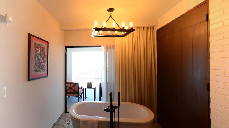 Soaking tub retreat with balcony access at Vista Encantada resort.