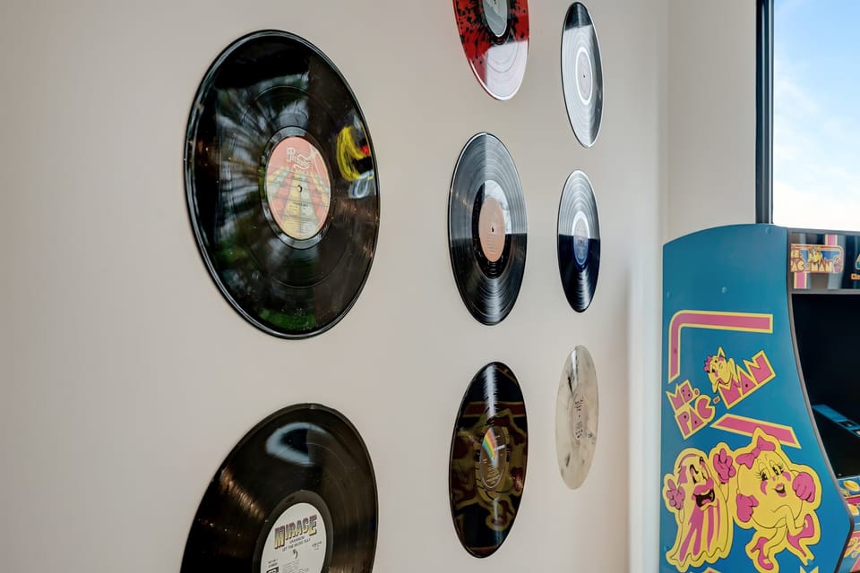 Experience your music oasis! This stylish rental features vintage vinyl decor and an arcade for group game nights, perfect for bachelorette parties or family reunions. Enjoy luxe comforts and the vibrant vibe of Downtown Nashville!