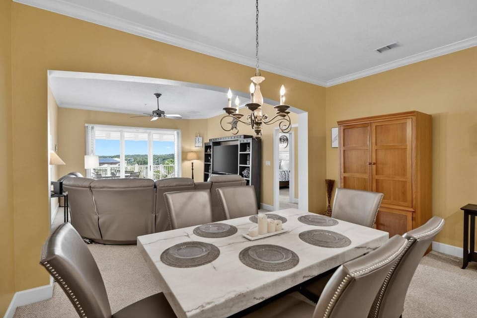 Dining space just off the kitchen and living area, offering a welcoming spot for shared meals, easy conversation, and convenient entertaining.