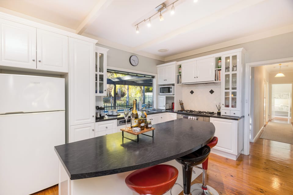Fully equipped kitchen with all essential cooking items.