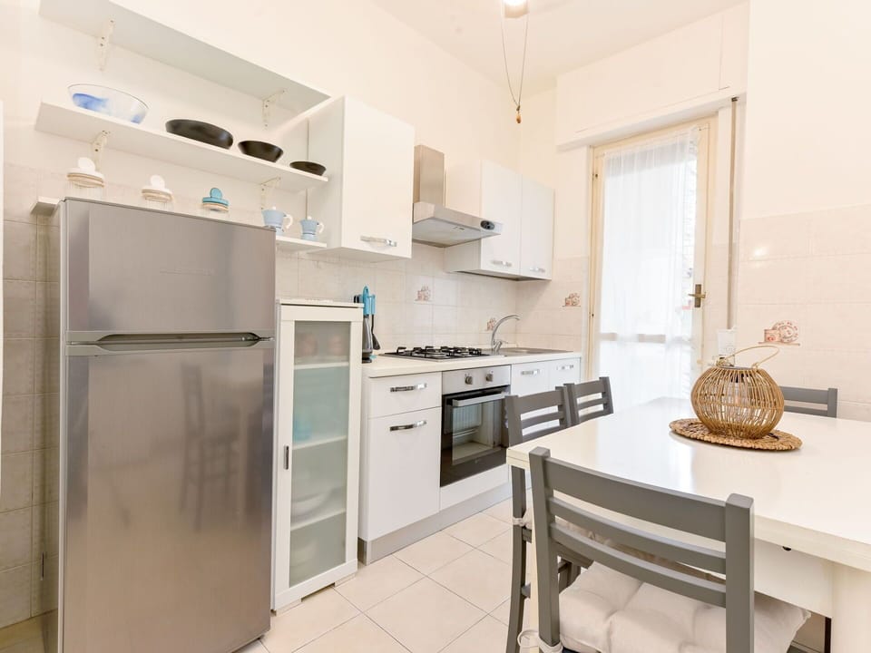 Furniture, Interior Design, Flooring, Floor, Wood, Ceiling, Major Appliance, Kitchen Appliance, Room, Apartment