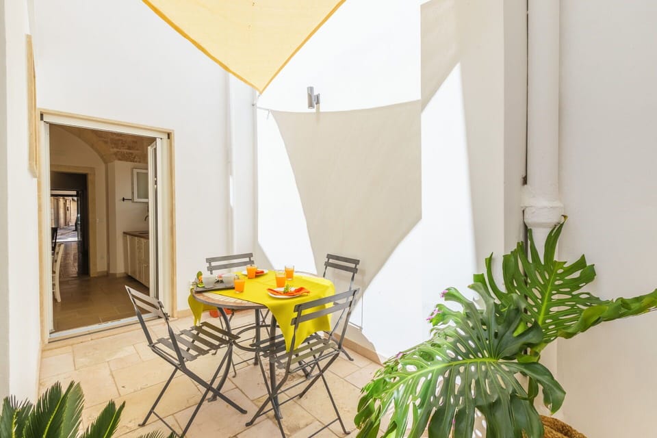 Furniture, Interior Design, Chair, Ceiling, Shade, Wood Stain, Houseplant, Kitchen & Dining Room Table, Outdoor Furniture, Eco Hotel