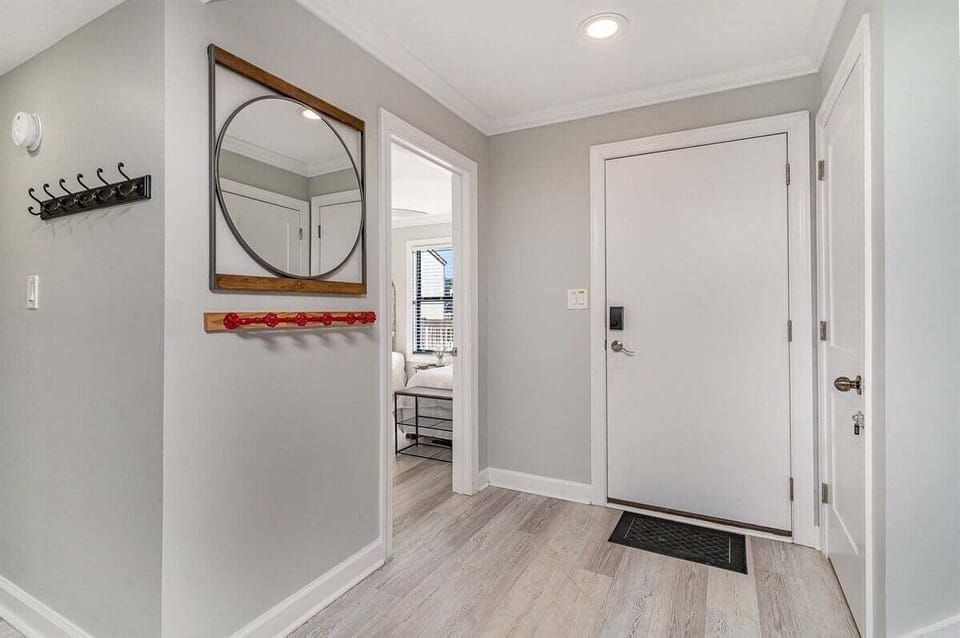 Welcoming entryway with coastal décor and easy access to the main living areas.