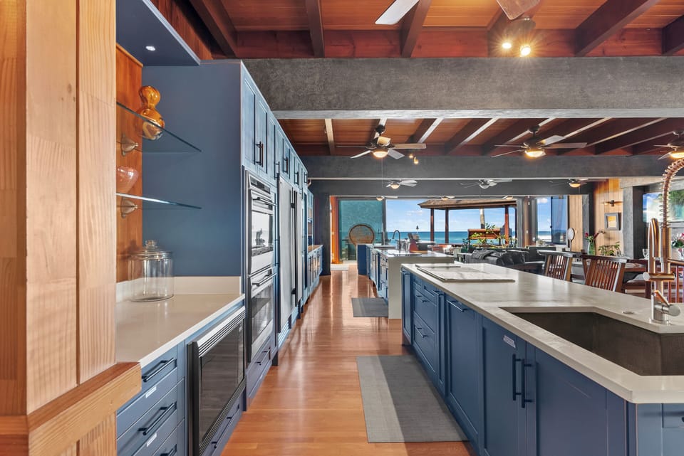 Cook with ease in the spacious chef's kitchen, where professional-grade appliances, expansive countertops, and seamless flow keep everyone connected.