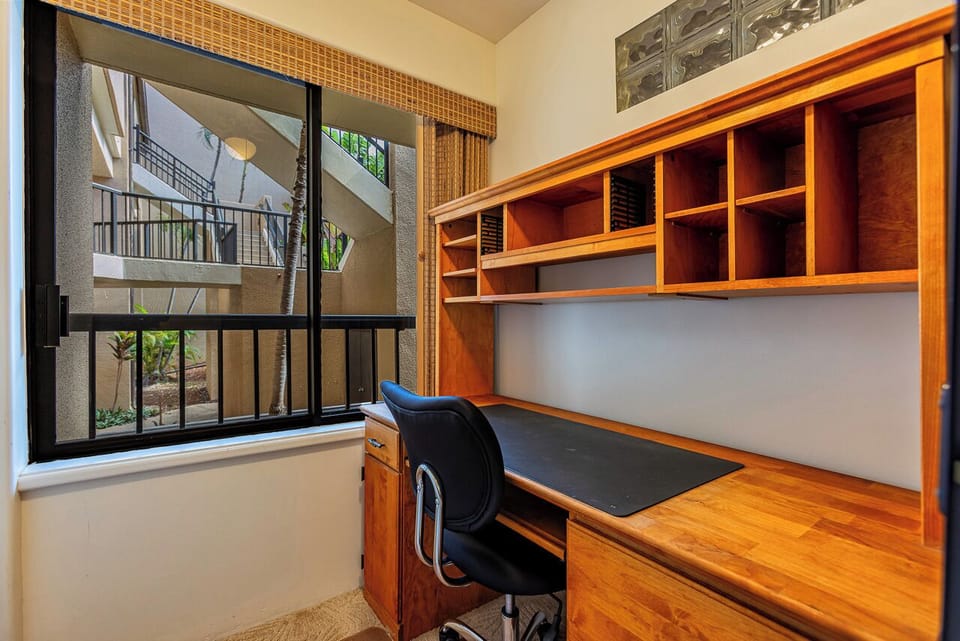 Guest bedroom with an attached office space.