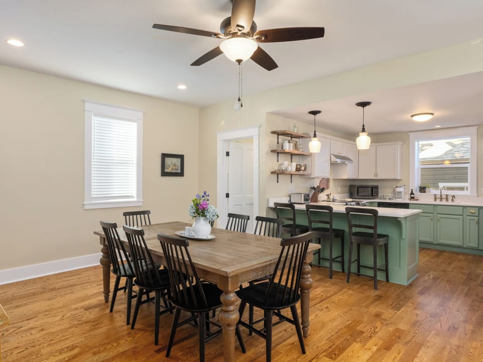 Dining room and kitchen with downstairs bathroom.