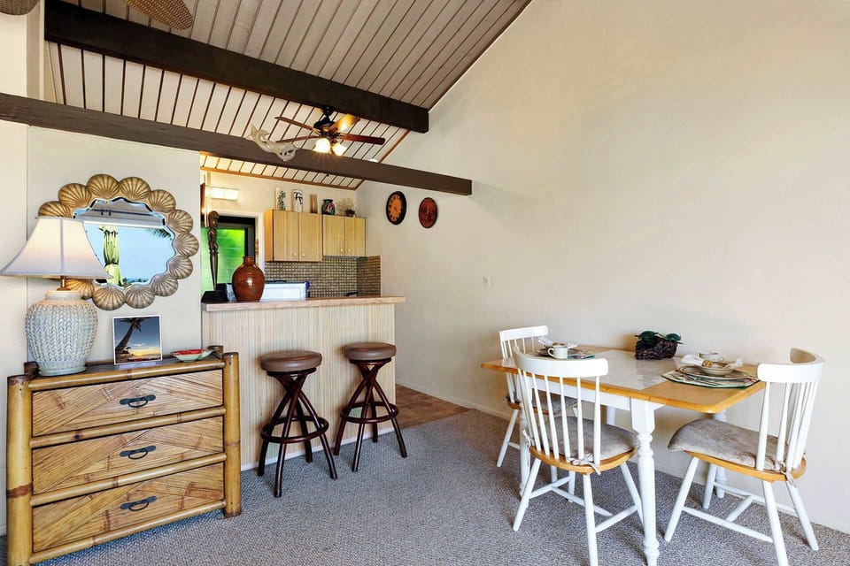 Dining table with seating for 3 and Kitchen bar counter with seating for 2