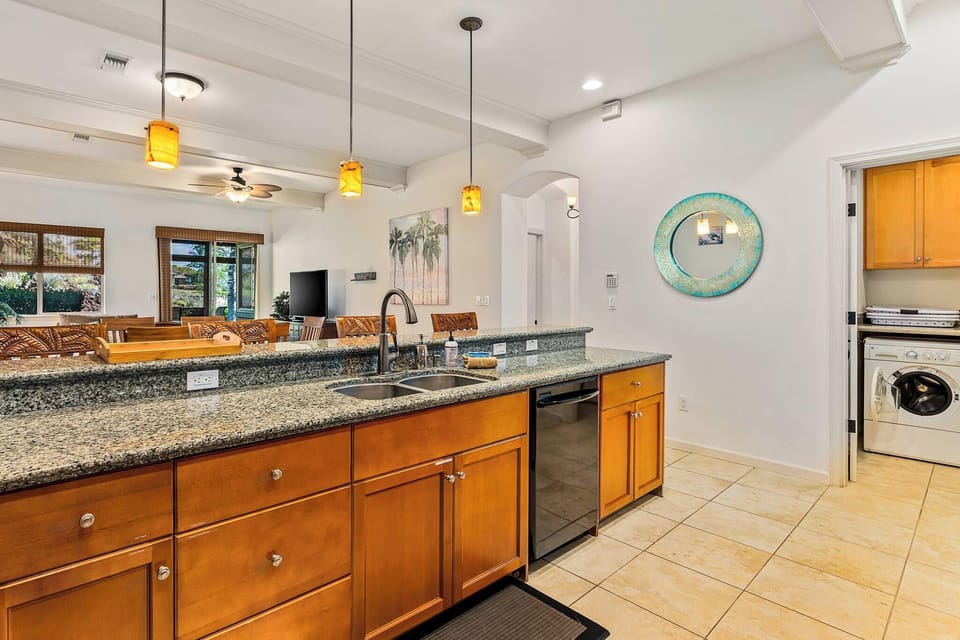 Kitchen with toaster, dishwasher, coffee maker and more