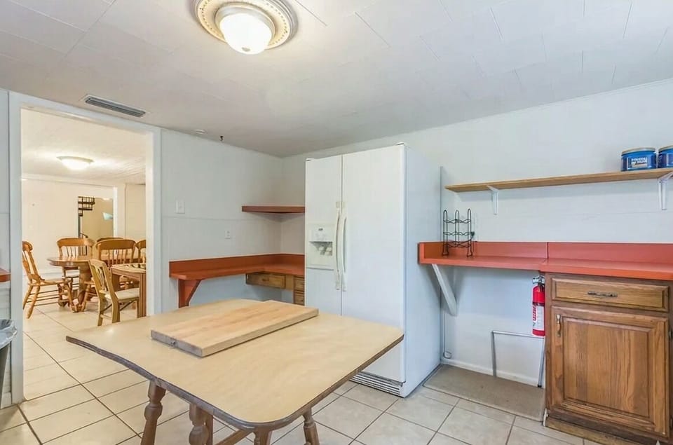 Indoors, Floor, Furniture, Table, Chair