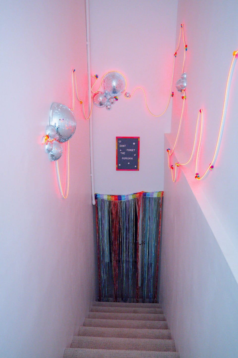 Entrance leading down to the basement TV room