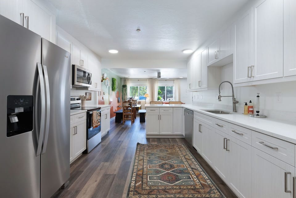 Fully stocked kitchen with plenty of cookware and dishware for large groups