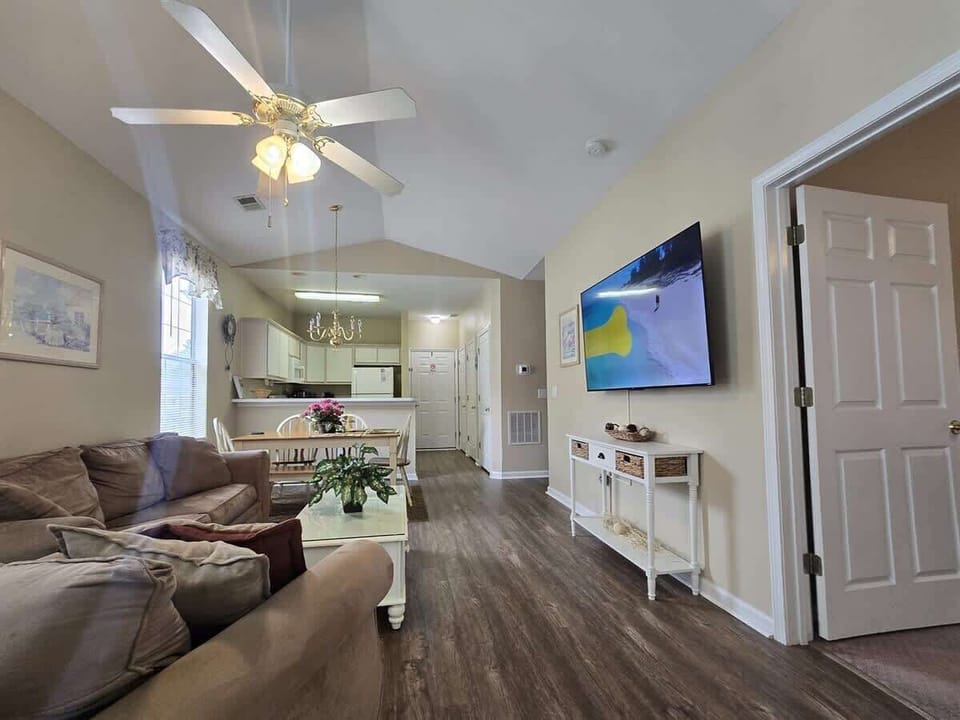 Spacious Open Floor Plan with Living Space and Dining Area