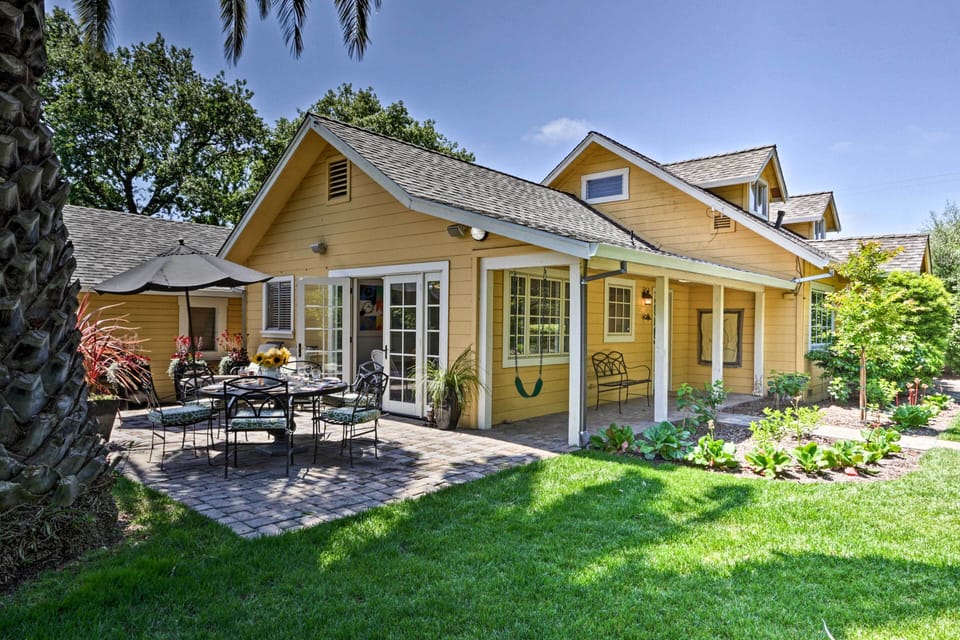 Enjoy alfresco dining in this charming garden seating area