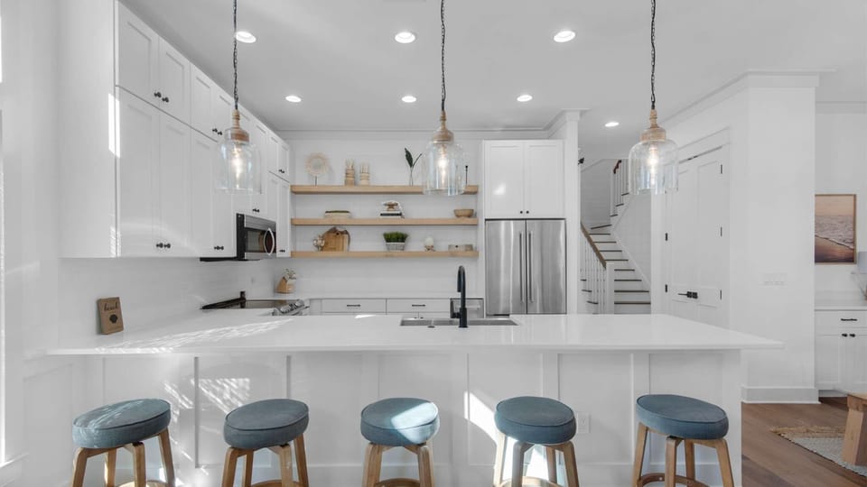 Kitchen: Drip coffee maker, Keurig, blender, toaster oven, waffle maker, cooking utensils, tableware