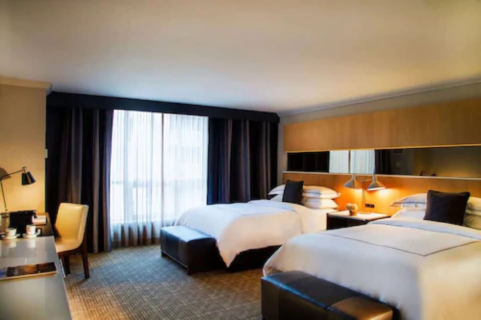 Unit with 2 Queen beds. Exact unit will be assigned upon arrival. Views, colors, and decor may vary.