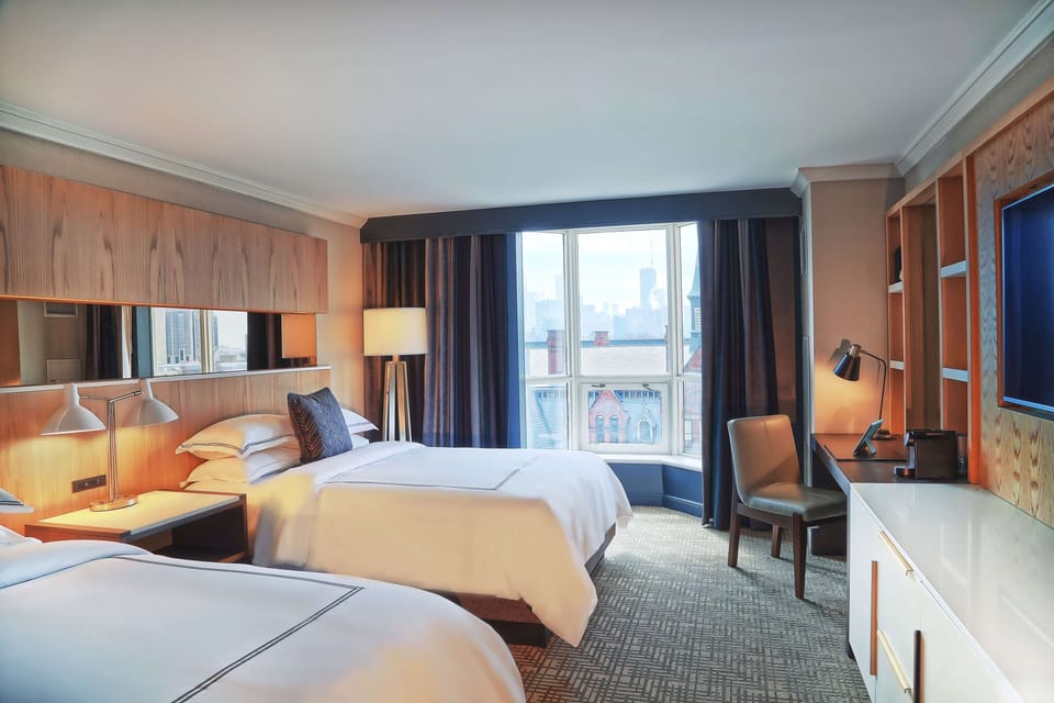 Unit with 2 Queen beds. Exact unit will be assigned upon arrival. Views, colors, and decor may vary.