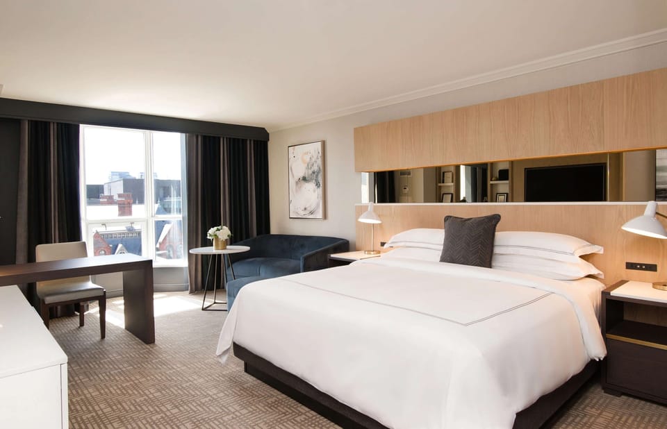 Unit with 1 King bed. Exact unit will be assigned upon arrival. Views, colors, and decor may vary.