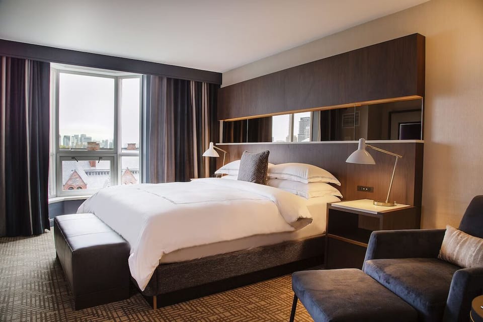Unit with 1 King bed. Exact unit will be assigned upon arrival. Views, colors, and decor may vary.